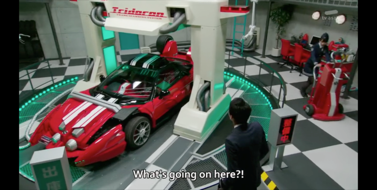 If Tridoron parks in the Drive Pit, then how has Tomari been getting it for the pat 6 months? Has he just been parking it wherever and Mr. Belt remoted it back to the Drive Pit this one time? This confuses me.